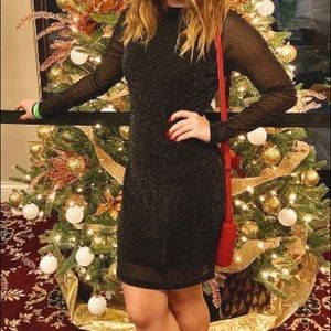 Bodycon black glitter looking dress.